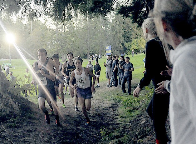 Nathan Beamer of Arlington leads the pack as it runs along a trail at Cedarcrest Golf Course in Marysville Oct. 3. He went on to finish second.