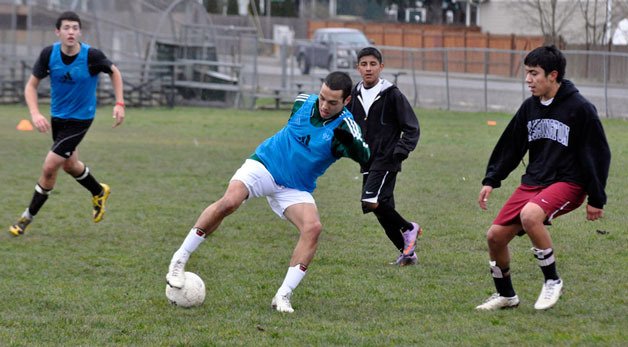 Marysville-Pilchuck junior Anthony Johnson keeps possession of the ball during a two-touch drill.