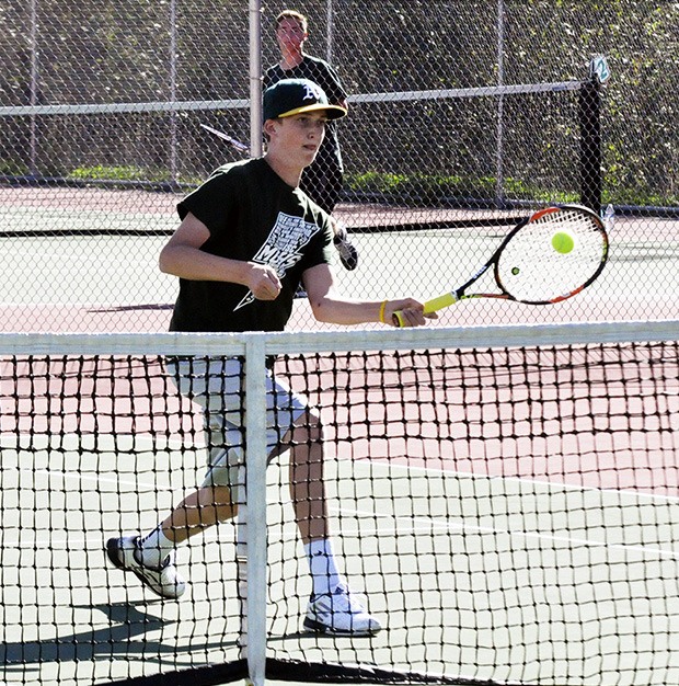 Nolan Lechner keeps volley alive.