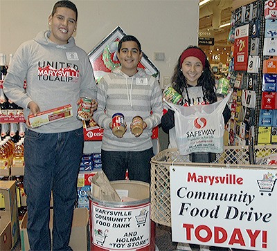 Students help collect food.
