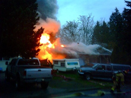 Marysville firefighters battle an April 3 fire at a house in the 12100 block of 52nd Avenue.