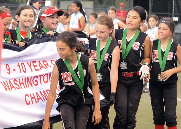 Marysville All-Stars receive the district championship banner june 23.