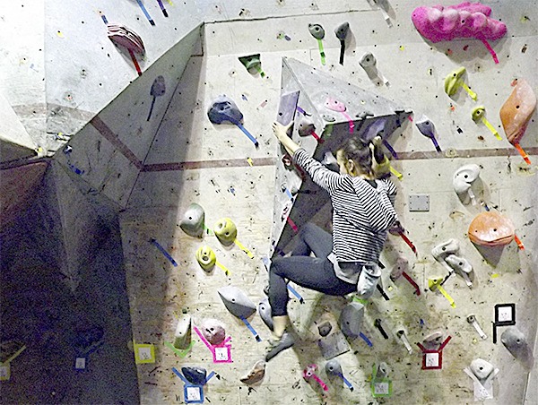 Sidney Trinidad of Arlington climbs on a practice wall in Everett. She recently placed second in a world championship competition.