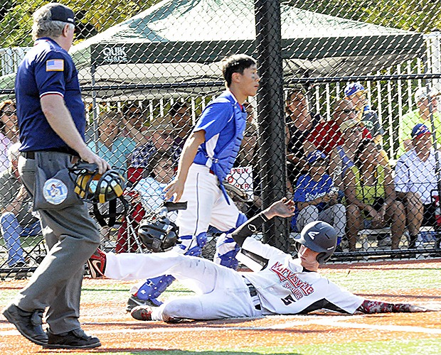 Hunter Leiren slides home to keep the game close against Richmond.