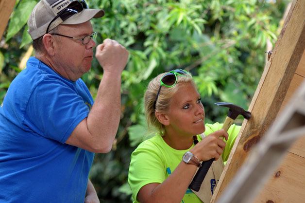 Rotarian Mike Stephenson and his daughter Katie build a schoolhouse for villagers in Guatemala.