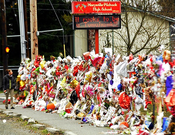 The fence at Marysville-Pilchuck High School became a memorial to the slain students.