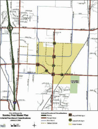The yellow portion of the map highlights the area targeted by the city for light industrial and commercial development. The map also shows the city’s preliminary ideas for new roads in the area.