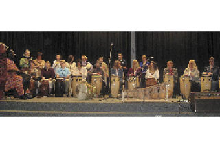 Saeed Abbas performs with the Presidents Elementary School staff and with the Haller Middle School Drum Ensemble in February this year. Abbas will perform with his Ghanaian ensemble Gye Nyame at Lincoln Theater May 30 and he will be in Arlington for a Haller Middle School assembly May 29.