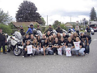 The 2008 Marysville-Pilchuck fastpitch team got a police escort on their way out of town. They played three games at the SERA Fields in Tacoma