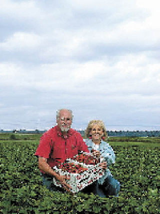 Mike and Dianna Biringer hold a box of big