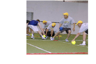 Competitive division runner up Oompa Loompas dash into neutral territory to arm themselves at the beginning of a bout.