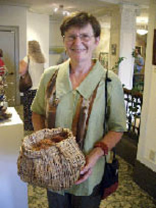 Judy Zugish of Bouquet Banque in Marysville makes baskets and some of them are in the Songs of the Siren art show presented by the Arts Council of Snohomish County in Everett through Oct. 23. An opening reception runs from 5-8 p.m.