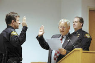 The last of three officers sworn in Sept. 22