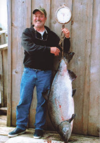 Marysville resident John Scalf proudly shows his prize catch. At 47½ inches