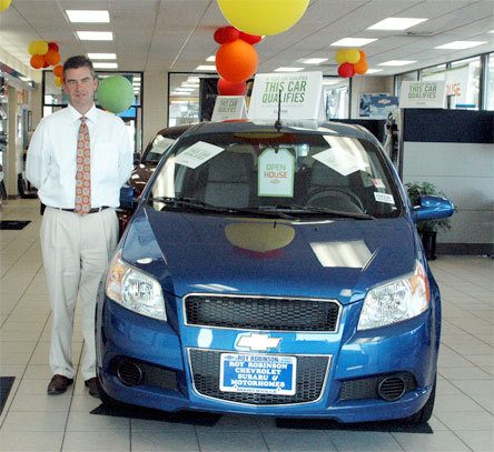 Roy Robinson sales manager Gordy Bjorg Jr. shows a 2009 Chevy Aveo