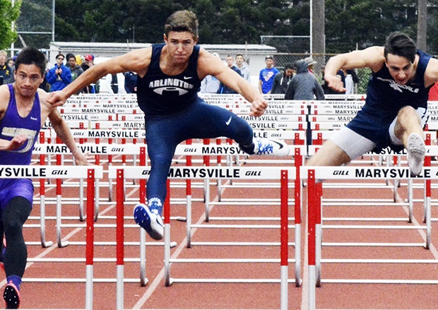 Brandon Adam/Staff PhotoArlington’s Cordell Cummings competing in the 110 hurdles in the district preliminaries.