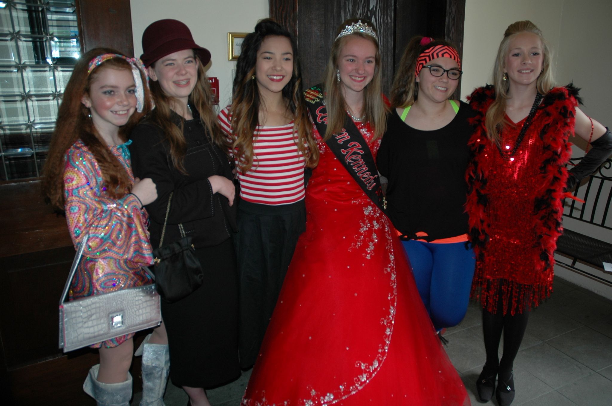 Kirk Boxleitner/Staff PhotoThe Marysville Strawberry Festival Royalty Court for 2016 modeled apparel from the 20th Century at the June 14 Fashion Show in the Marysville Opera House.