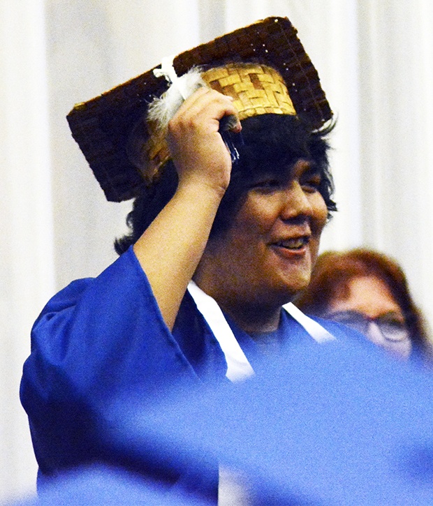 Brandon Adam/Staff PhotoArts and Technology Class of 2016 president Cyrus Williams leads the turning of the tassel during its graduation ceremony June 18.