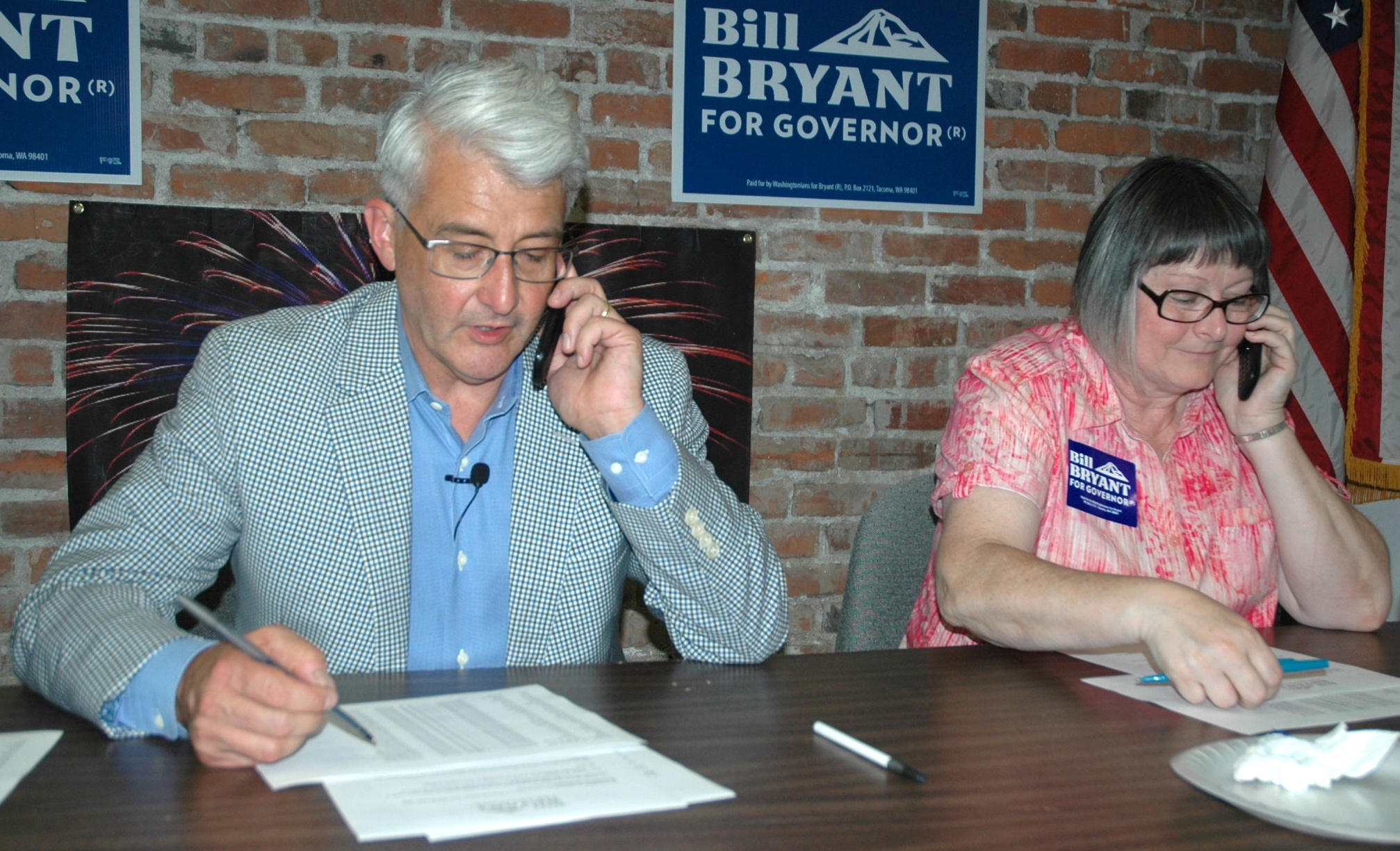 Kirk Boxleitner/Staff PhotoGubernatorial candidate Bill Bryant joins local volunteer Suzanne Campbell in calling voters.