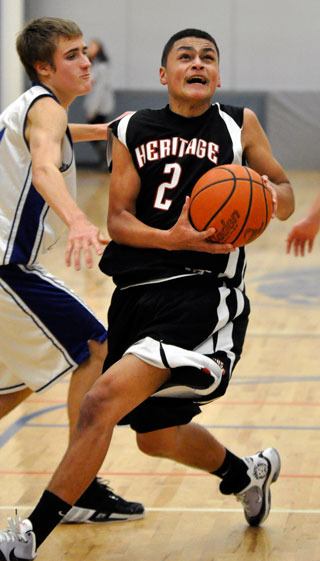 DJ Kidd drives to the hoop against Mount Vernon Christian.