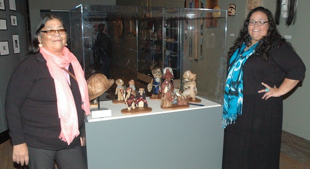 Judy and Heather Gobin proudly present the cedar dolls that won first place in the art show at the 89th annual Santa Fe Indian Market in 2010.
