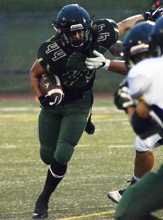 Brandon Adam/Staff PhotoGage Thomas of Marysville Getchell runs the ball in MG’s game against Arlington Sept. 16.