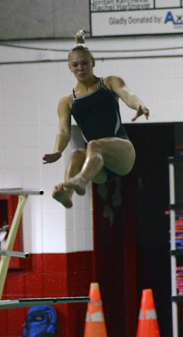 Brandon Adam/Staff PhotoChloe Bishop of Marysville Getchell in the air before she completes her dive.