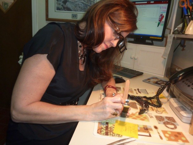 Kim Snyder fixes a watch clasp at Wagner Jewelers in Marysville on Nov. 20.