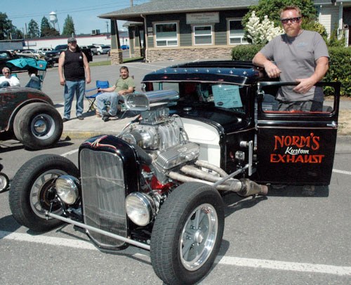 Arlington’s Norm Ross shows off the customized 1931 Ford Coupe that he’d originally obtained from Roger Graafstra at the Country Charm Dairy.