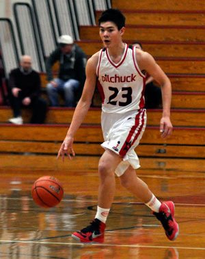 M-P’s Michael Painter dribbles down-court in a game against Glacier Peak on Jan. 11.