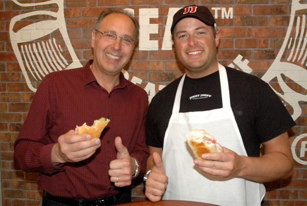 Ted and Kent Perillo enjoy their own subs at Jimmy John’s Gourmet Sandwich Shop in Smokey Point on May 2.