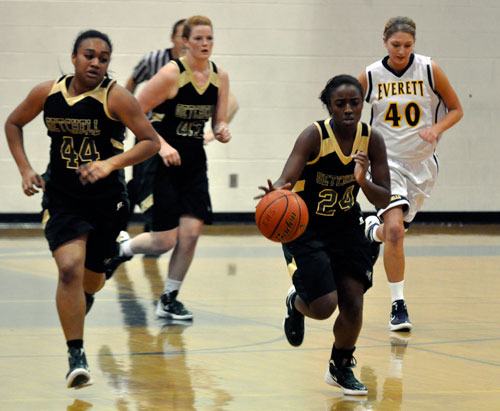 Marysville Getchell junior guard Khalyn King pushes the ball in transition against Everett on Dec. 22.