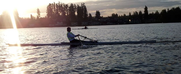 Marysville’s Vonna Posey rows at sunset on Lake Stevens as a member of the local North Cascades Crew.