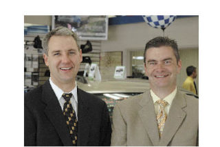 Roy Robinson General Manager Mark King and Chevrolet Sales Manager Gordy Bjorg Jr.