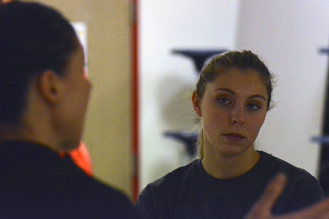 Marysville Getchell senior Gabby Grandbois listens to instruction from her coach and mom, Shannon Grandbois, at a recent practice. Brandon Adam/Staff Photo
