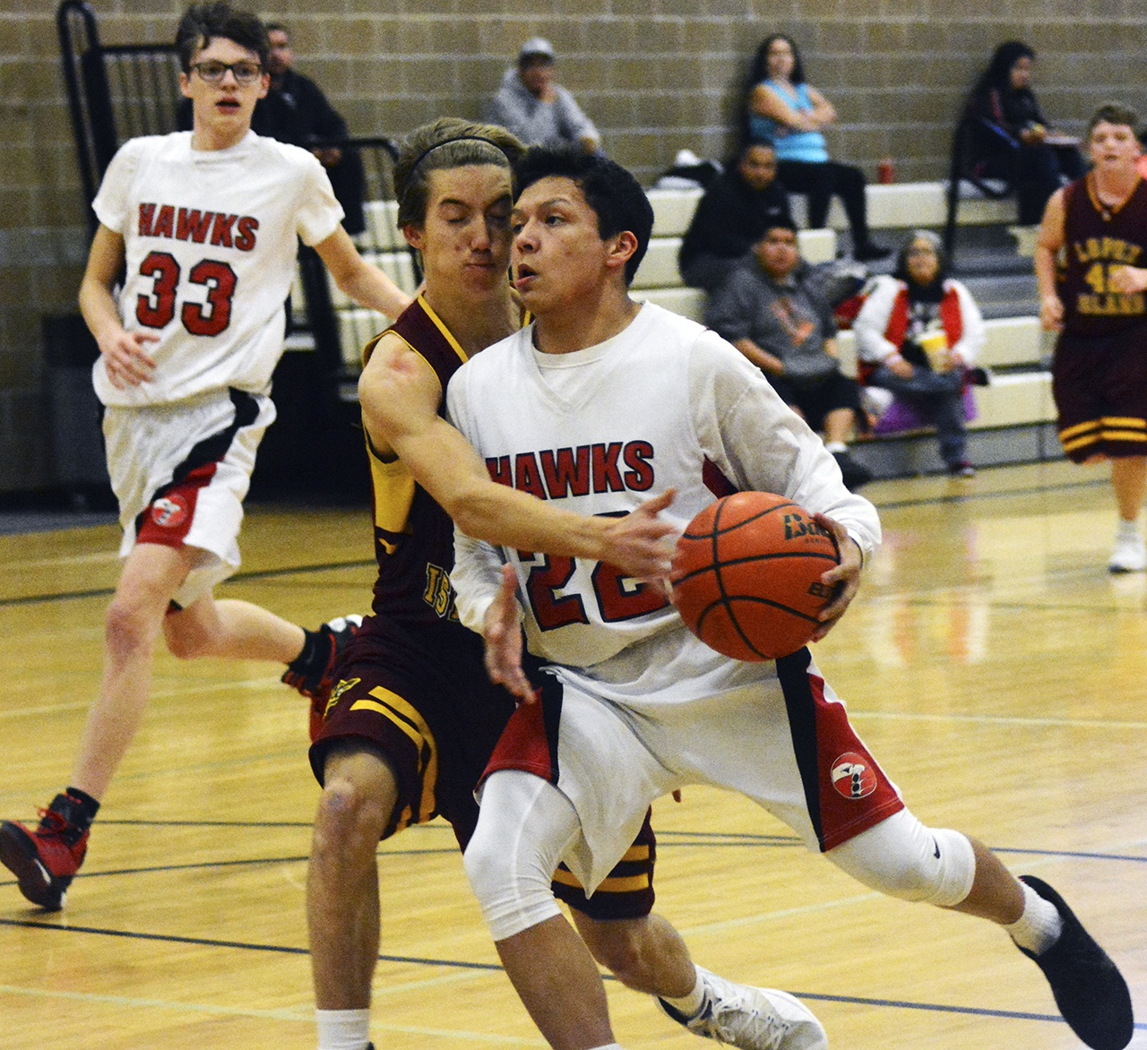 Tulalip Heritage&rsquo;s Josh Iukes drives for a layup. Brandon Adam/Staff Photo