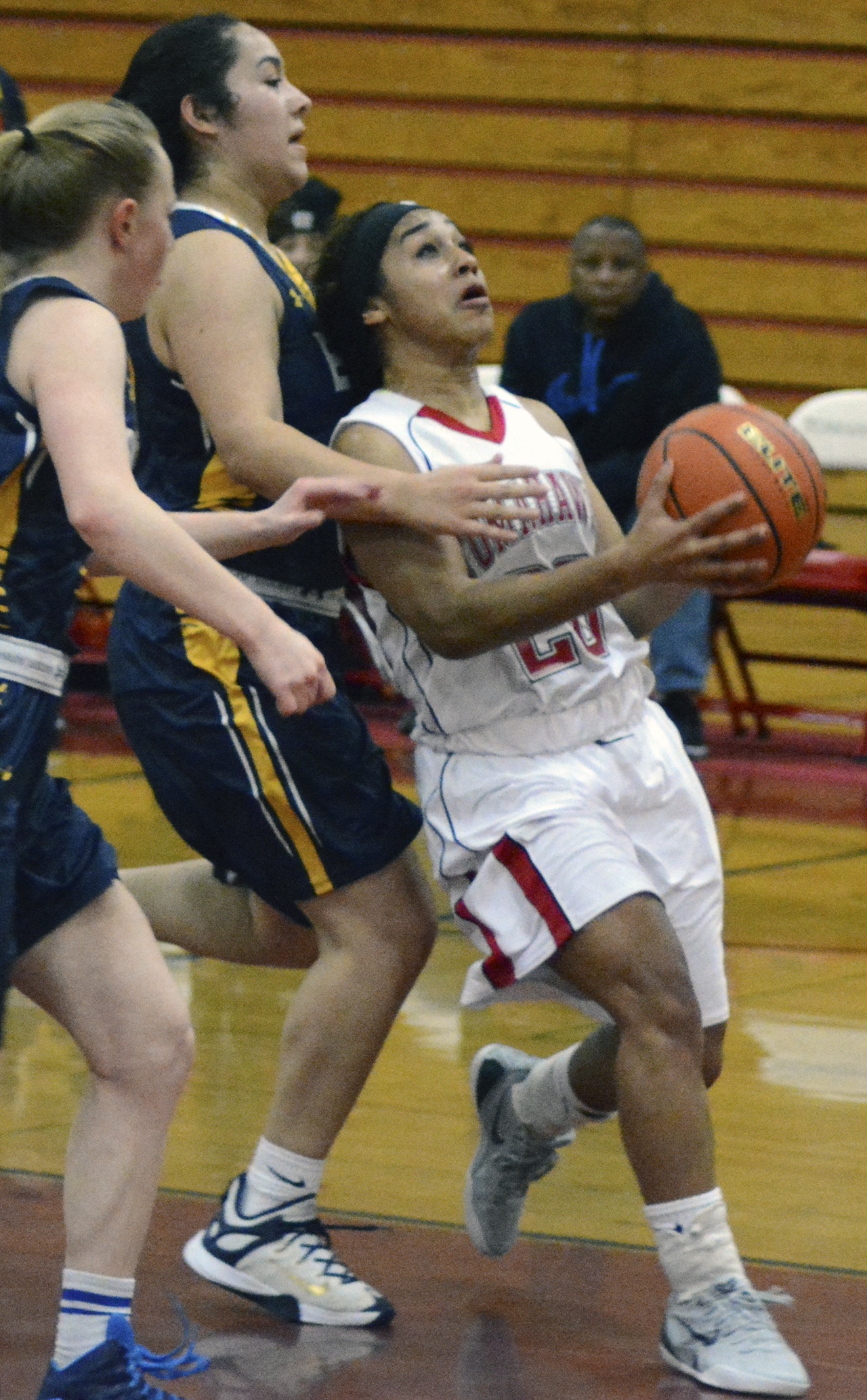Marysville-Pilchuck&rsquo;s Olivia Lee plants for a lay up.                                 Brandon Adam/Staff Photo