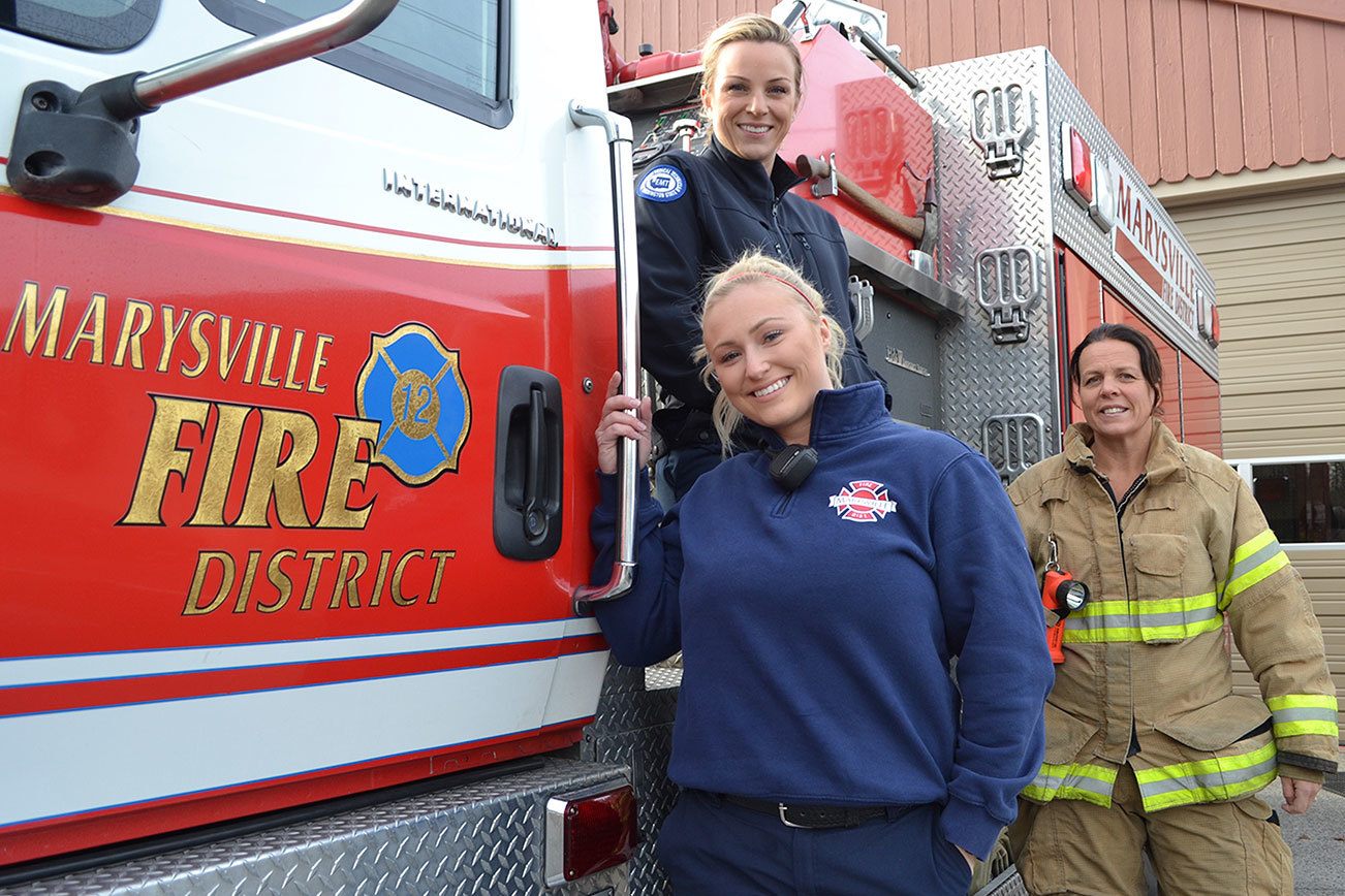 Women climbing the ladder as firefighters