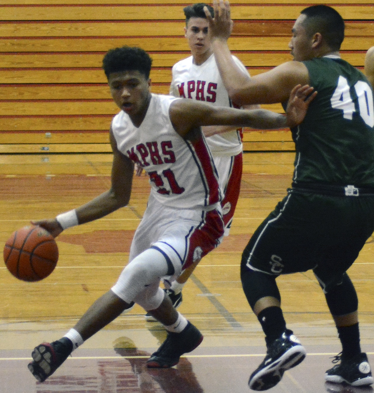 Marysville-Pilchuck&rsquo;s Raequan Battle dribbles against a Shorecrest defender.                                Brandon Adam/Staff Photo