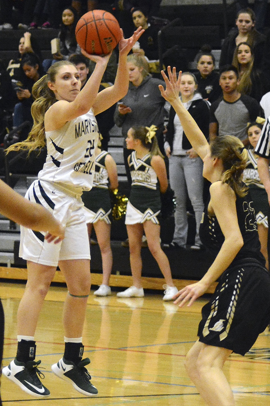 Marysville Getchell&rsquo;s Gabby Grandbois jumps before releasing a 3-pointer. Brandon Adam/Staff Photo