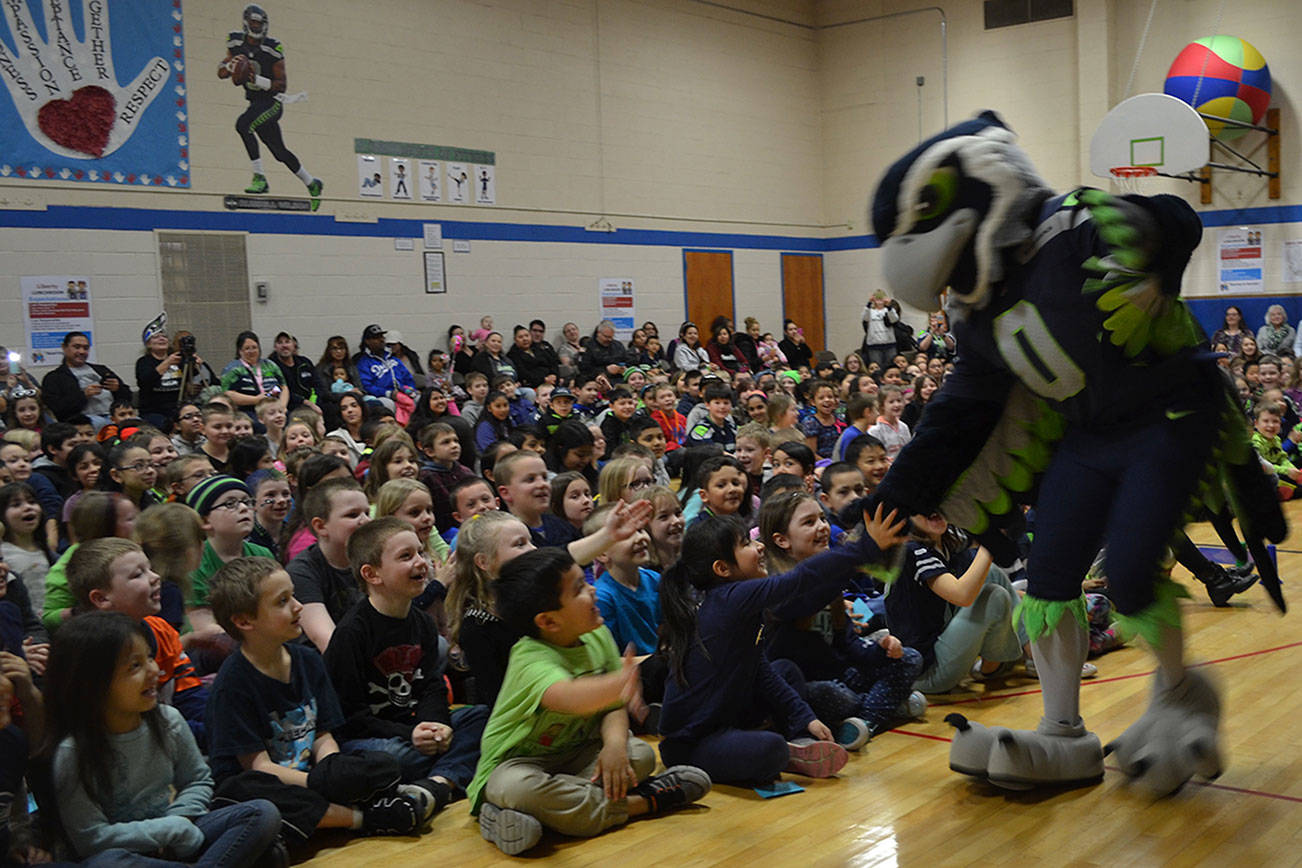 Blitz provides Seahawks power at M’ville school assembly
