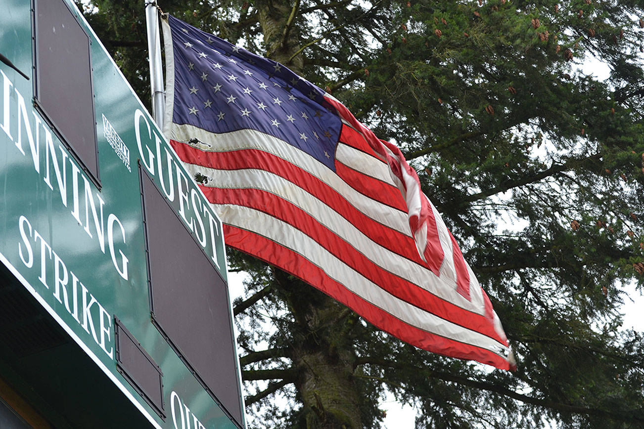Marysville is looking at regulating flagpoles, similar to this one at the Cedar Field ballpark. (Steve Powell/Staff Photo)