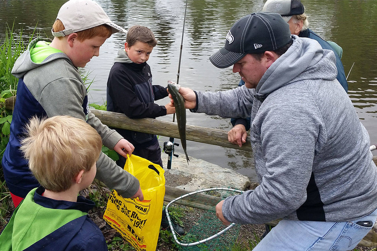 Kids enjoy fishing derby hook, line and sinker (slide show