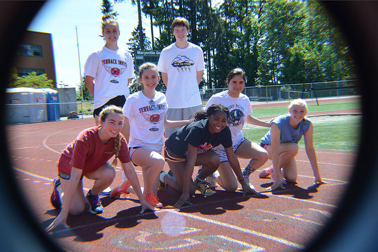 Going to state for MG are: front row: Kylah Brodahl, Kiarra Green, Chloe Bishop; middle: Sophie Alt, Sabrina Farrell; back: Maddie Grandbois and Greg Panther. (Steve Powell/Staff Photo)