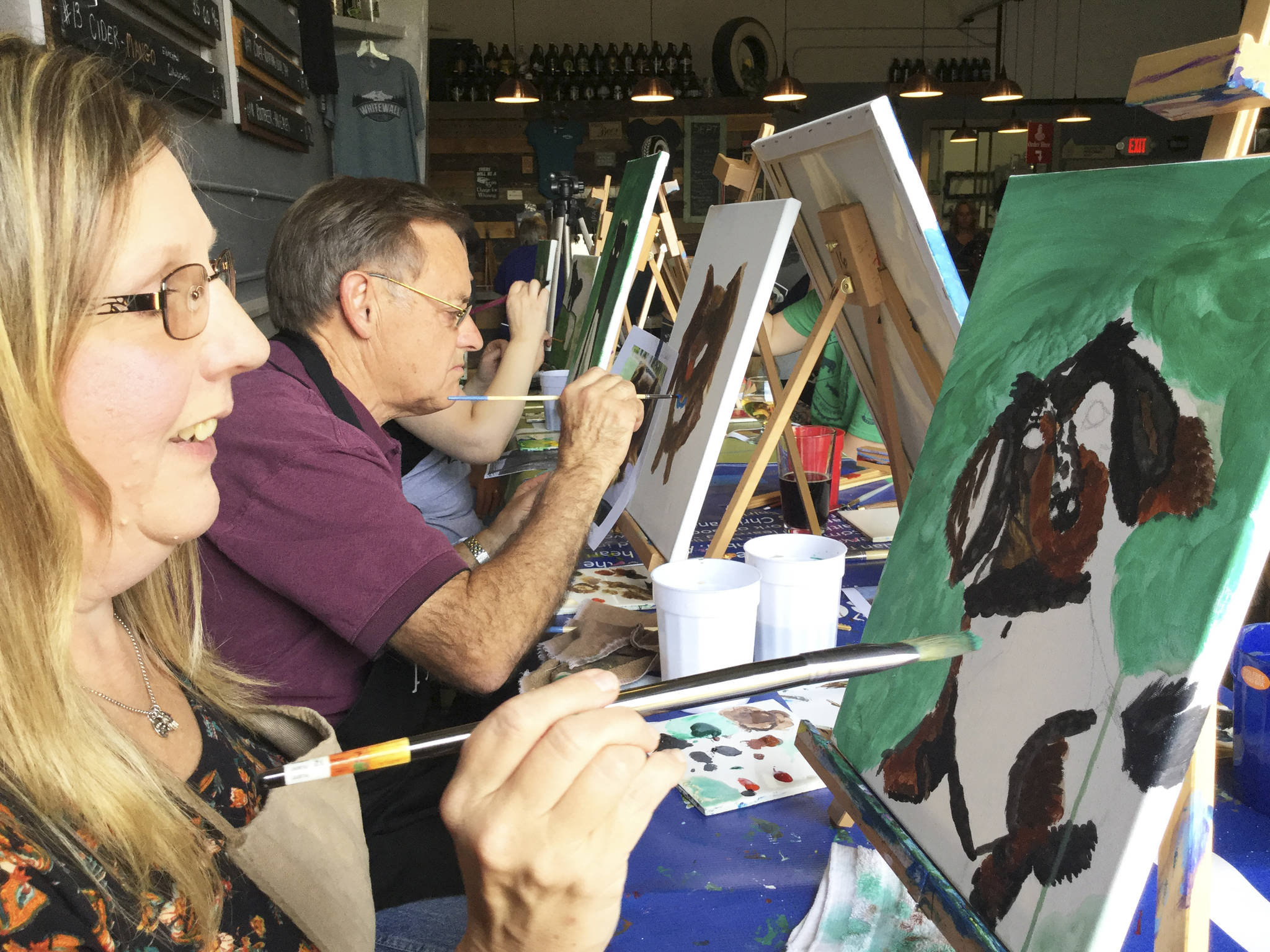 Pet lovers paint portraits of their pooches