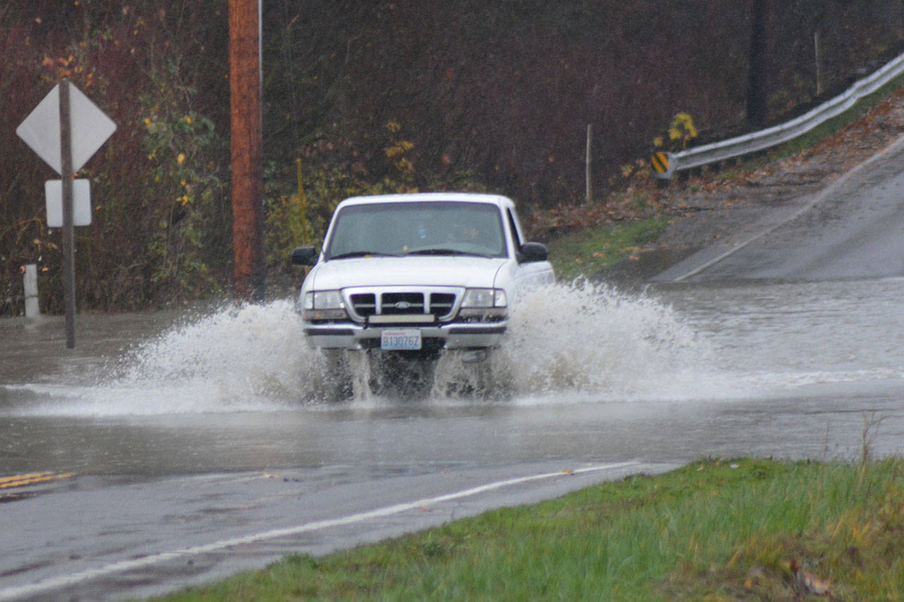 Rainy days and flooding never get bicyclist down in Silvana