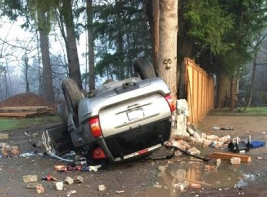 Neighbors rescue baby in rollover; loaded weapon in diaper bag; dad charged