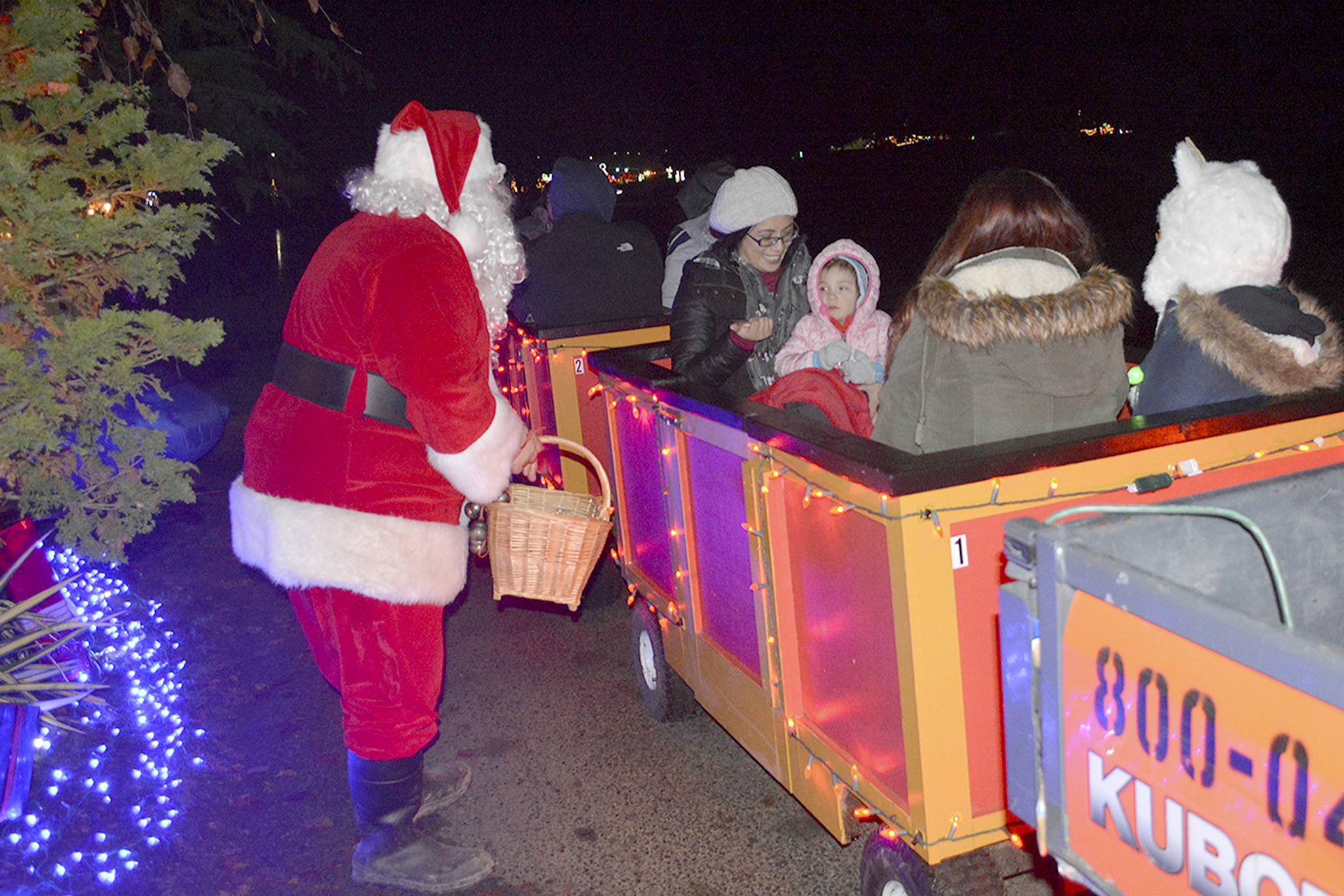 Christmas lights bright on golf course under clear skies (slide show)