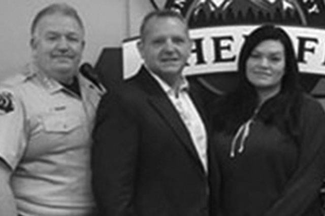 Arlington widow honored for husband’s service