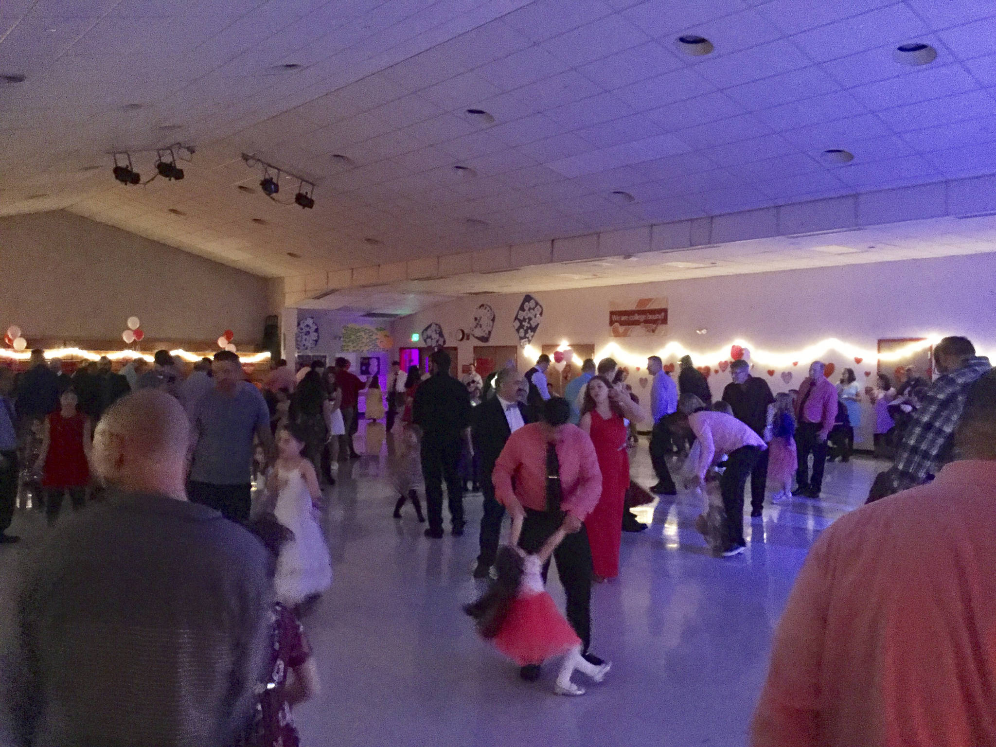 Fathers, daughters bond at special Valentine’s dance